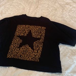 Size S/M oversized cropped black cheetah print tee.